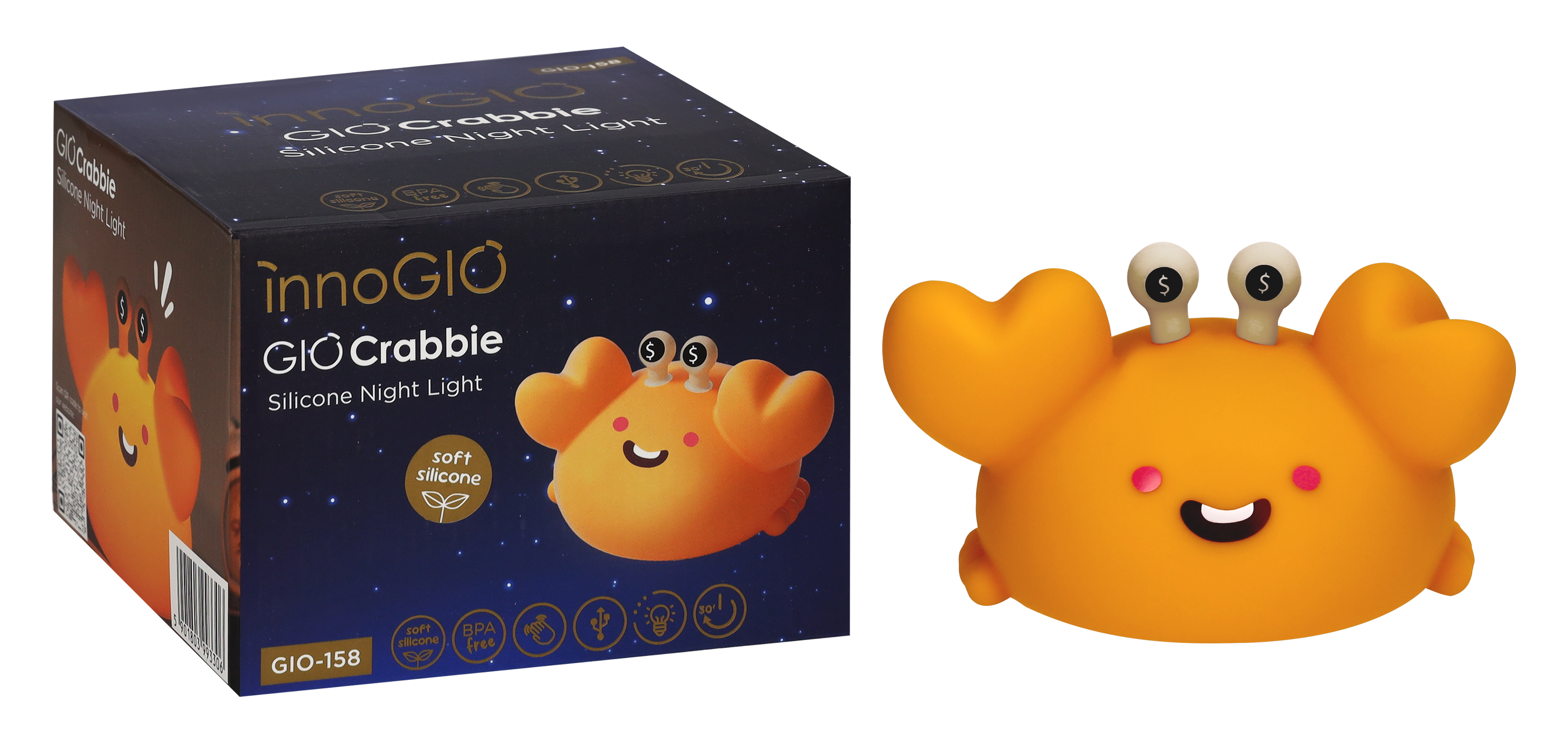 Pomarańczowa lampka nocna w kształcie kraba ze znakami dolara na oczach stoi obok swojego pudełka, które ma gwiaździste tło.