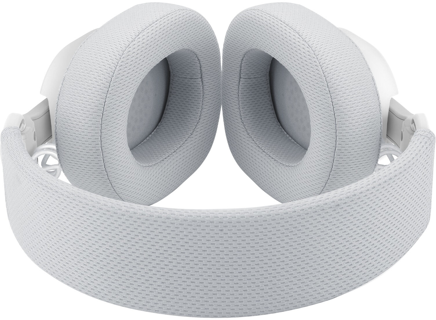 Zbliżenie białych słuchawek. Nauszniki są wyściełane, podobnie jak pałąk. Design jest nowoczesny i minimalistyczny.