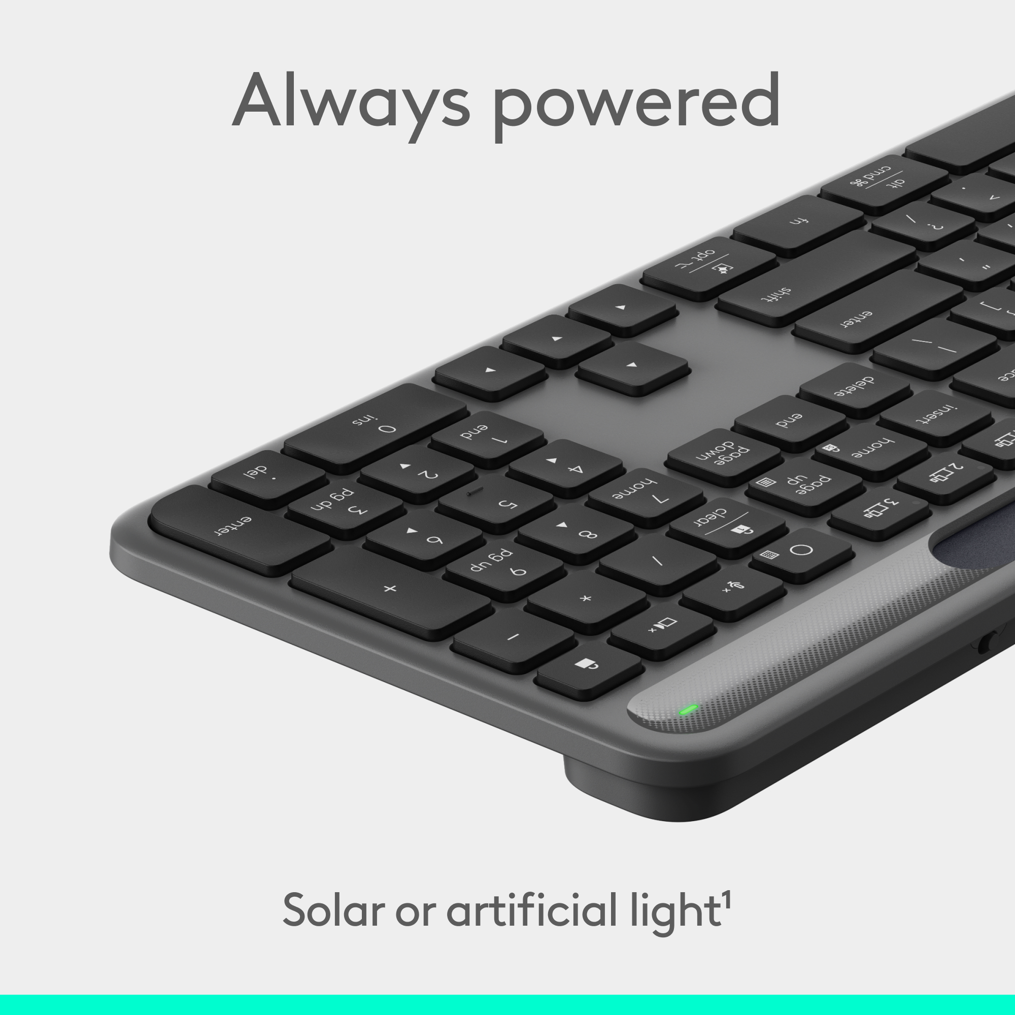 Un clavier gris foncé avec des touches noires est présenté avec les mots Always powered et Solar or artificial light¹.