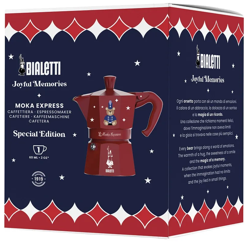 Egy piros Bialetti Moka Express kávéfőző, különleges kiadás, medve dizájnnal az elején, a dobozában.