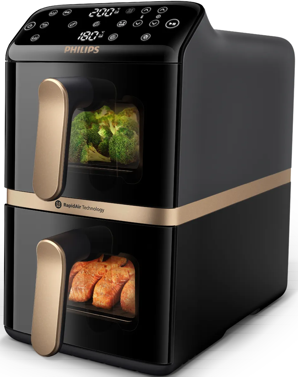 Friteuse à air Philips noire avec deux compartiments. L'un contient du brocoli, l'autre du saumon. Accents dorés. L'écran affiche 200°C et 180°C.