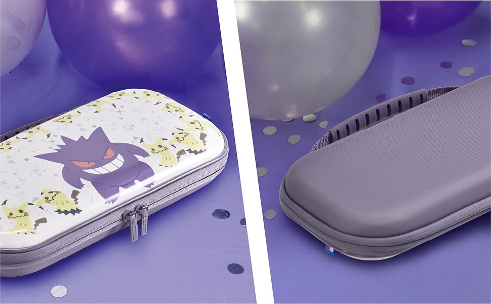 Das Bild zeigt ein lilafarbenes Gengar-Etui und ein graues Etui. Ballons und Konfetti sind im Hintergrund. Die Etuis liegen auf einer lila Oberfläche.