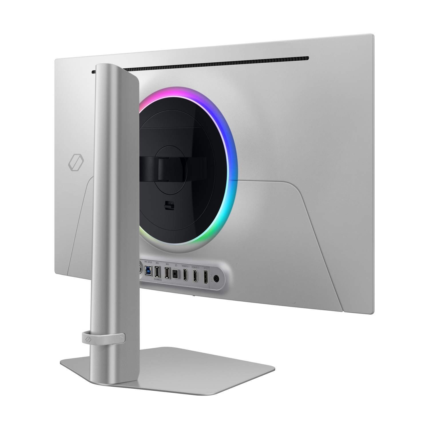 Il retro di un monitor per computer argentato. Ha un'apertura circolare con un anello luminoso arcobaleno. Sono visibili varie porte.