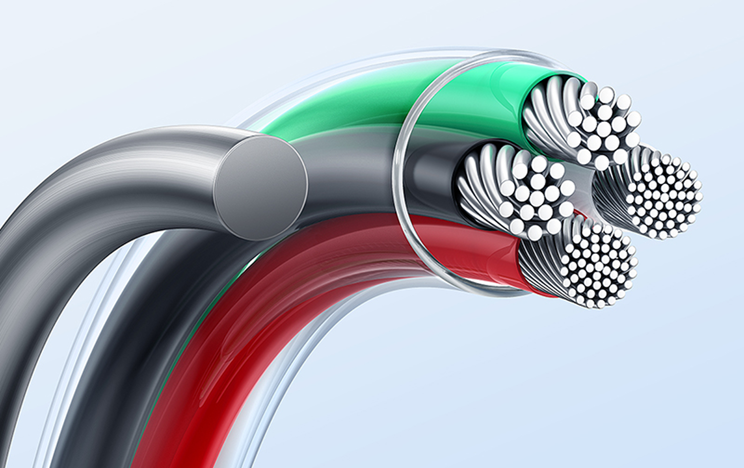 Primer plano de cables eléctricos de colores. Se ven cables rojos, negros y verdes, con conductores plateados en el interior.