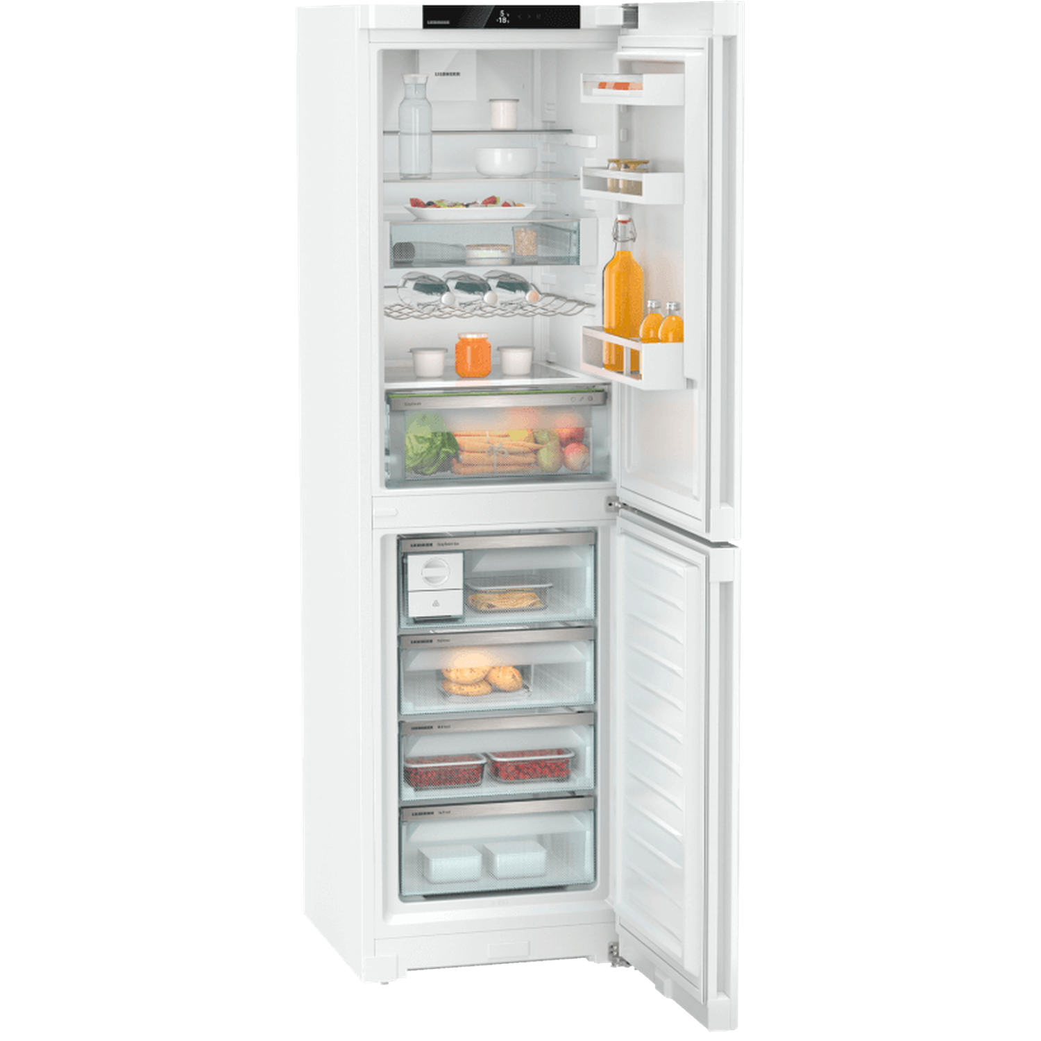 Open white refrigerator filled with food items. Includes fruits, vegetables, drinks, and various containers. The door is ajar.