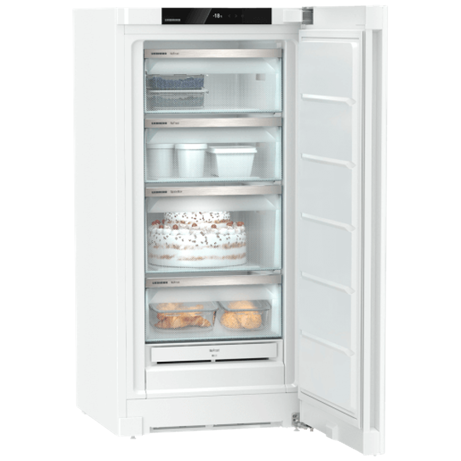 Open white freezer with multiple shelves. Various food items visible including containers, a cake, and prepared meals.