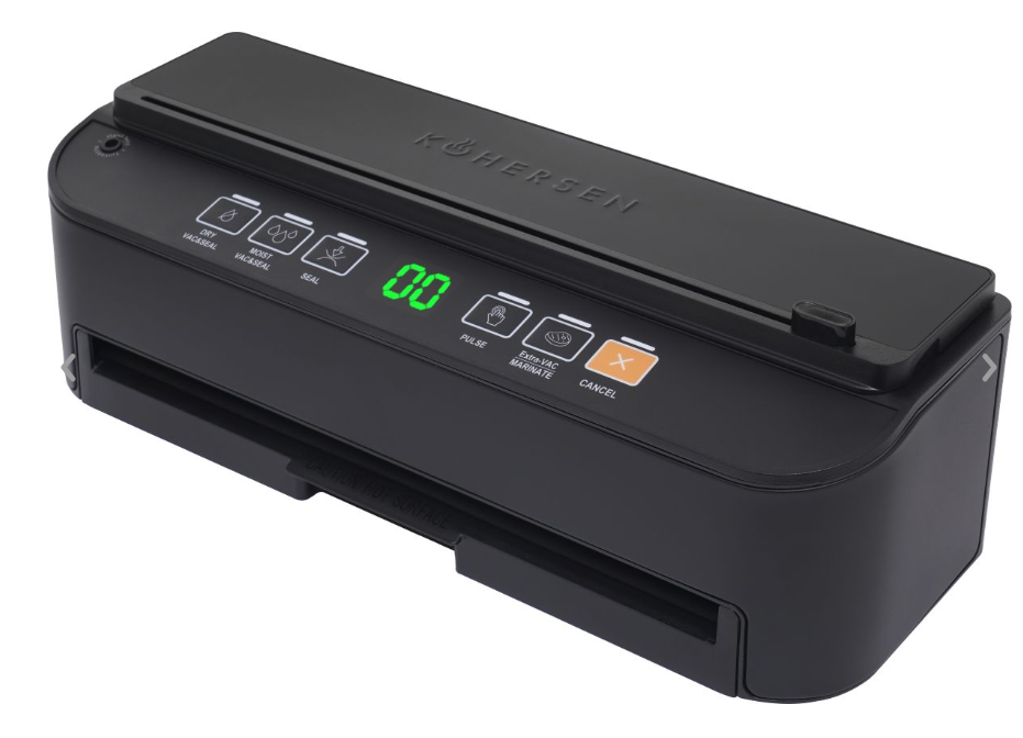 Czarna zgrzewarka próżniowa z wyświetlaczem cyfrowym i przyciskami funkcyjnymi. Logo 'Kuhersen' na górze. Przyciski obejmują suche/wilgotne uszczelnianie próżniowe, uszczelnianie, puls, extra vac marynowanie, anuluj.