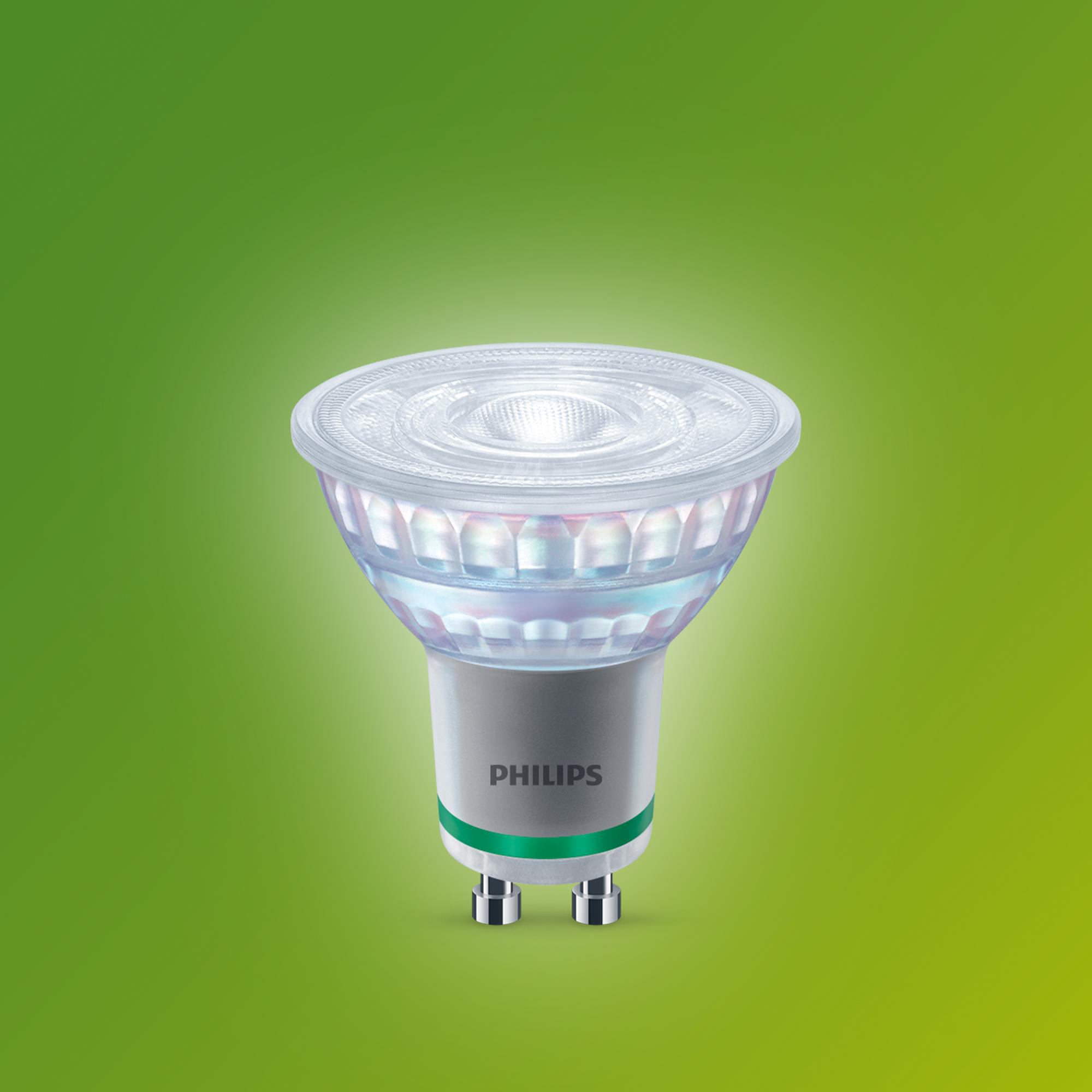 LED-Glühbirne auf grünem Farbverlauf. Die Glühbirne ist weiß und silber mit dem Philips-Logo.