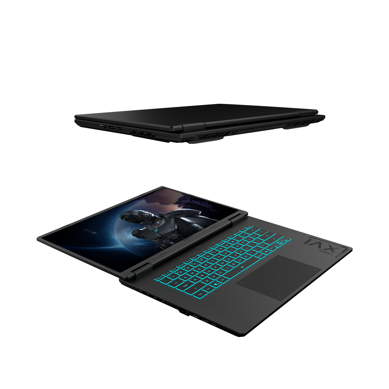 Portátil negro, abierto y cerrado, sobre fondo gris. Portátil abierto muestra escena espacial. Teclado con retroiluminación azul.