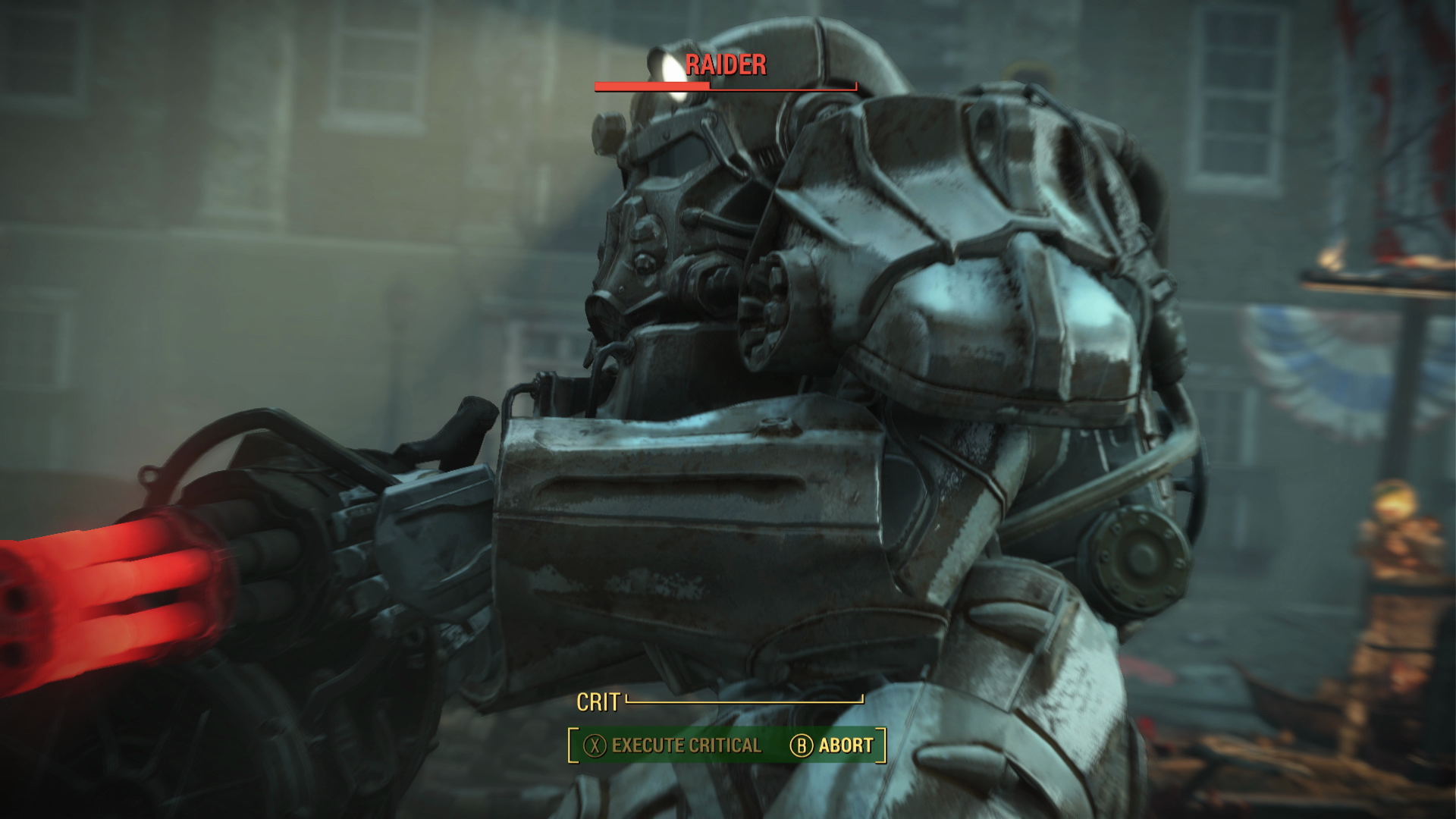 Un Raider en armure assistée est au centre. Un faisceau rouge jaillit d'une minigun. Le mot 'Raider' est au-dessus de la tête.