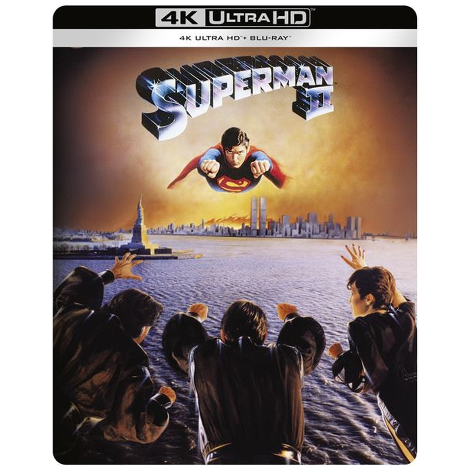 Superman III movie cover. Superman flies over water toward a city, people look up. The title is above Superman.