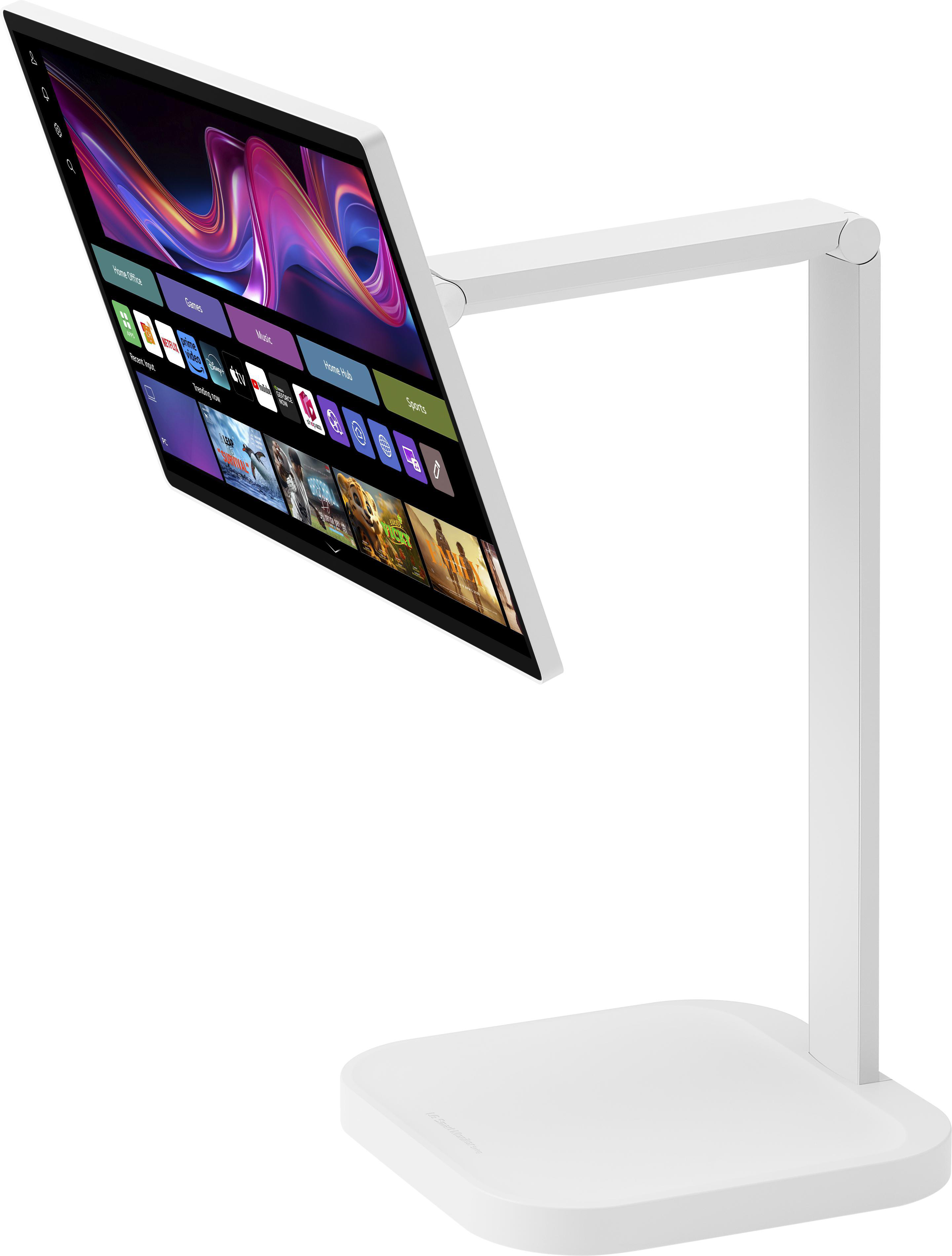 Ein weißer Monitor auf einem weißen Ständer. Der Bildschirm zeigt Apps und einen bunten Hintergrund.