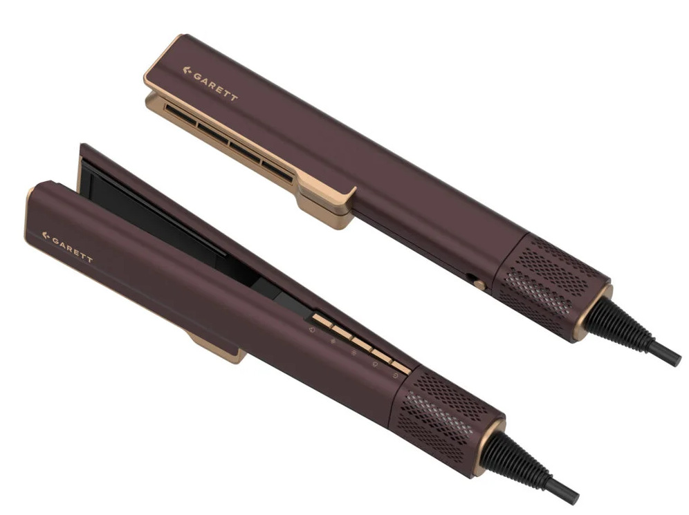 Dwie brązowo-złote prostownice GARETT. Jedna otwarta, druga zamknięta. Obie mają przewody zasilające i znajdują się na białym tle.