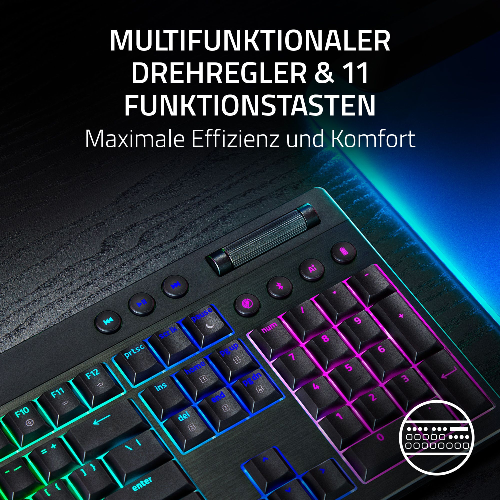 Nahaufnahme einer schwarzen Tastatur mit beleuchteten Tasten. Sie hat ein Rad und Funktionstasten. Text: 'Multifunktionsdrehregler'.