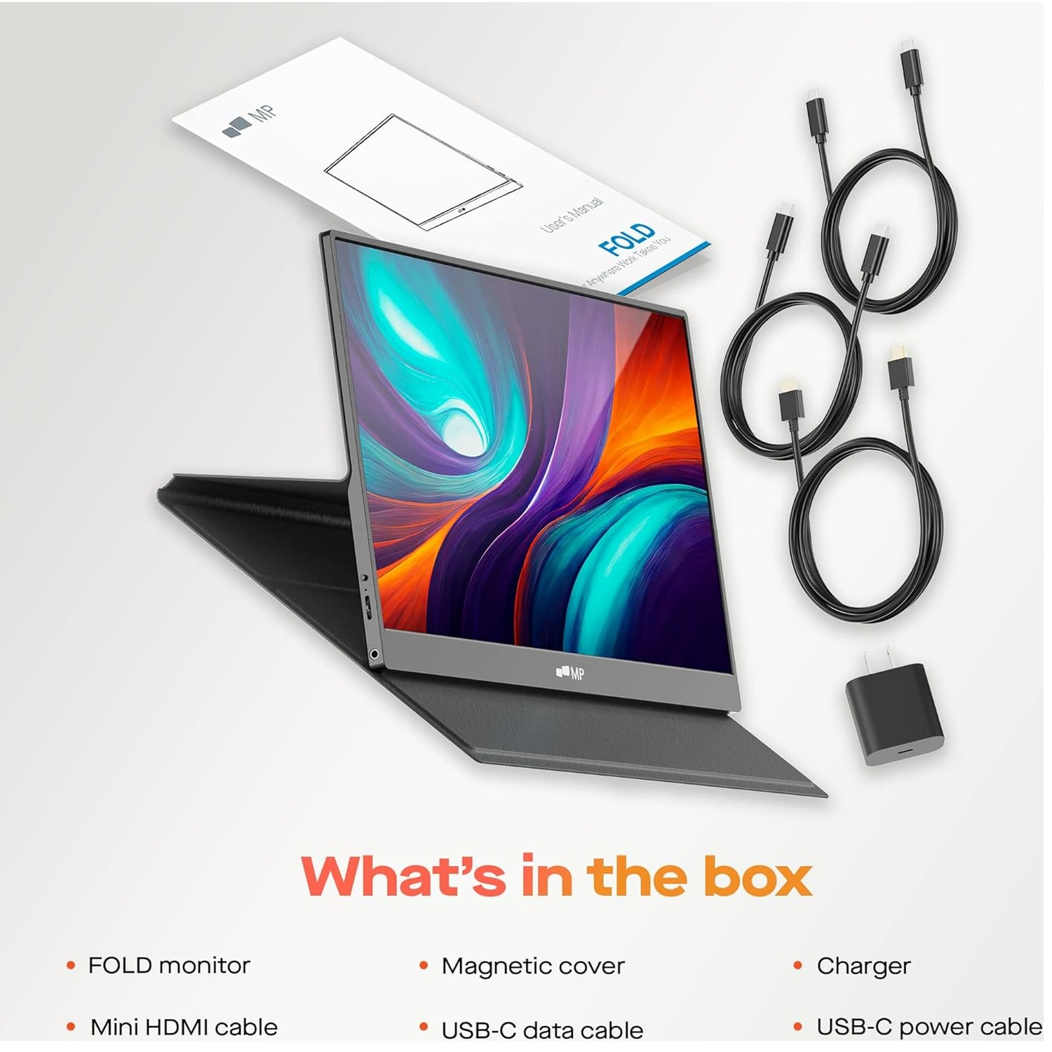 A monitor with accessories, including cables, a charger, and a user manual, arranged on a white surface.