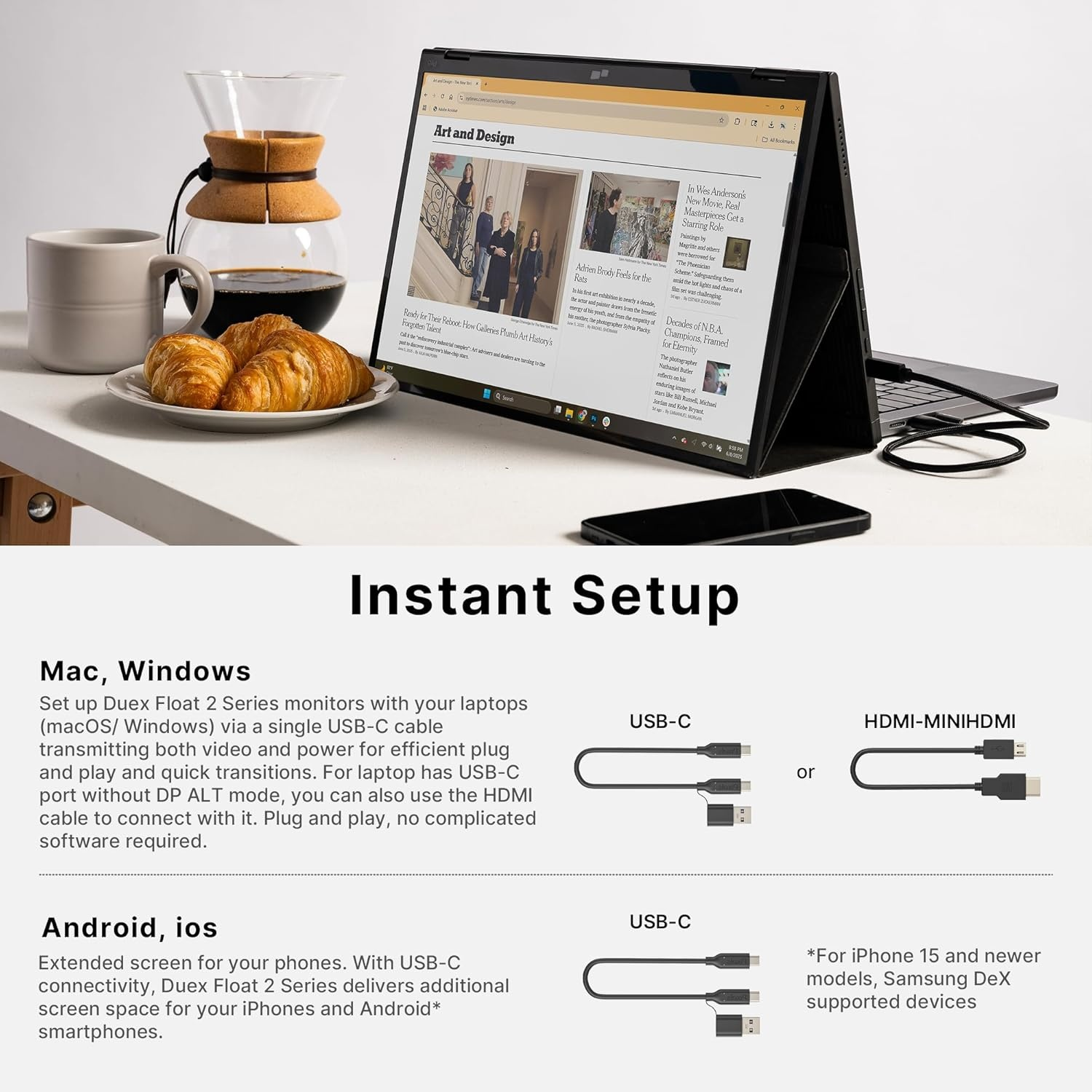 Laptop with news articles, coffee setup with croissants, and a phone on a white table.