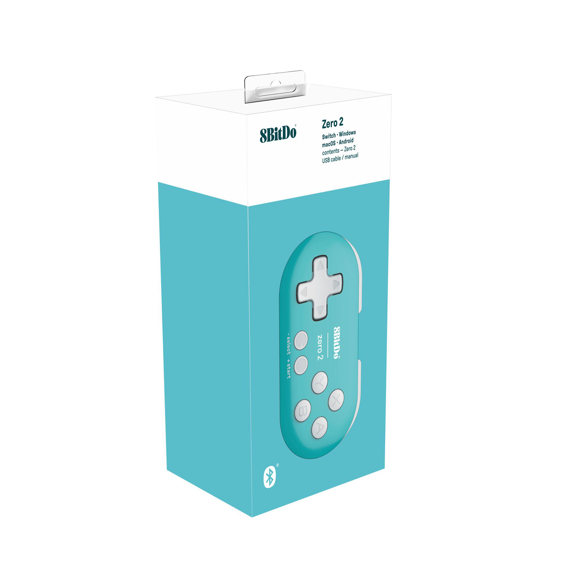Eine Schachtel mit einem türkisfarbenen Controller. Auf der Schachtel steht 'Zero 2' und '8BitDo'. Der Controller hat Knöpfe.