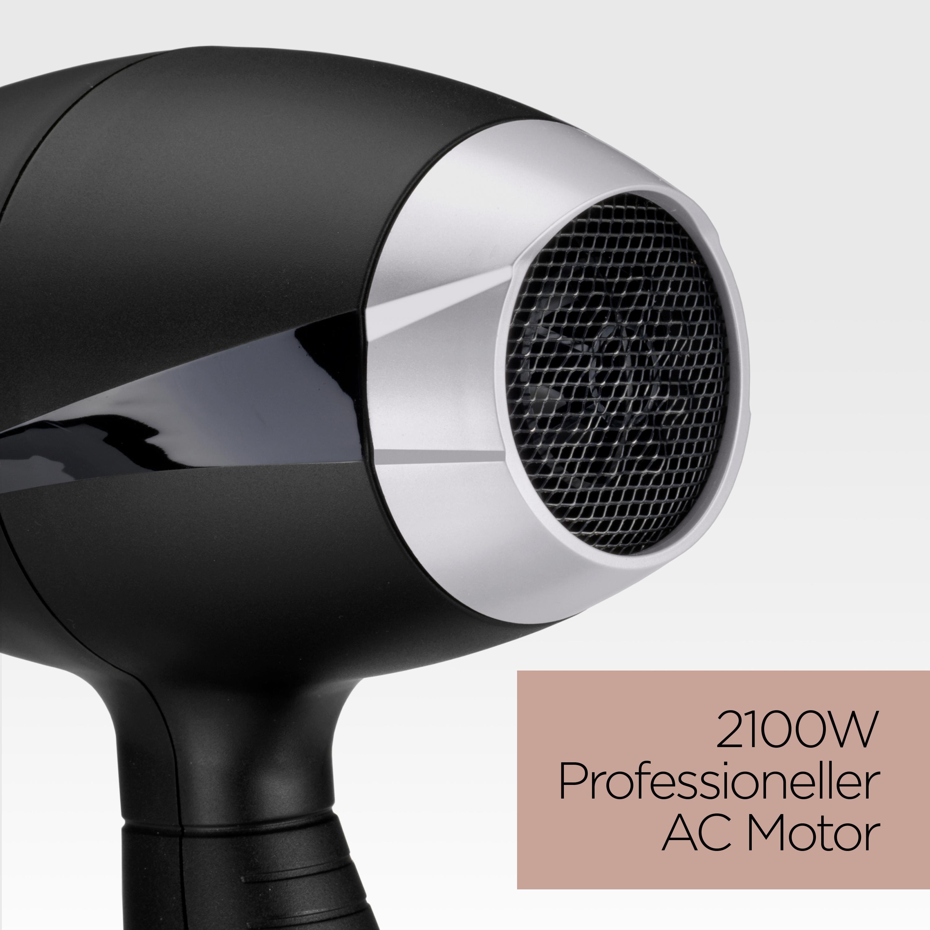Schwarzer Haartrockner mit silbernem Rand um den Luftauslass. Text unten: 2100W Professioneller AC Motor.