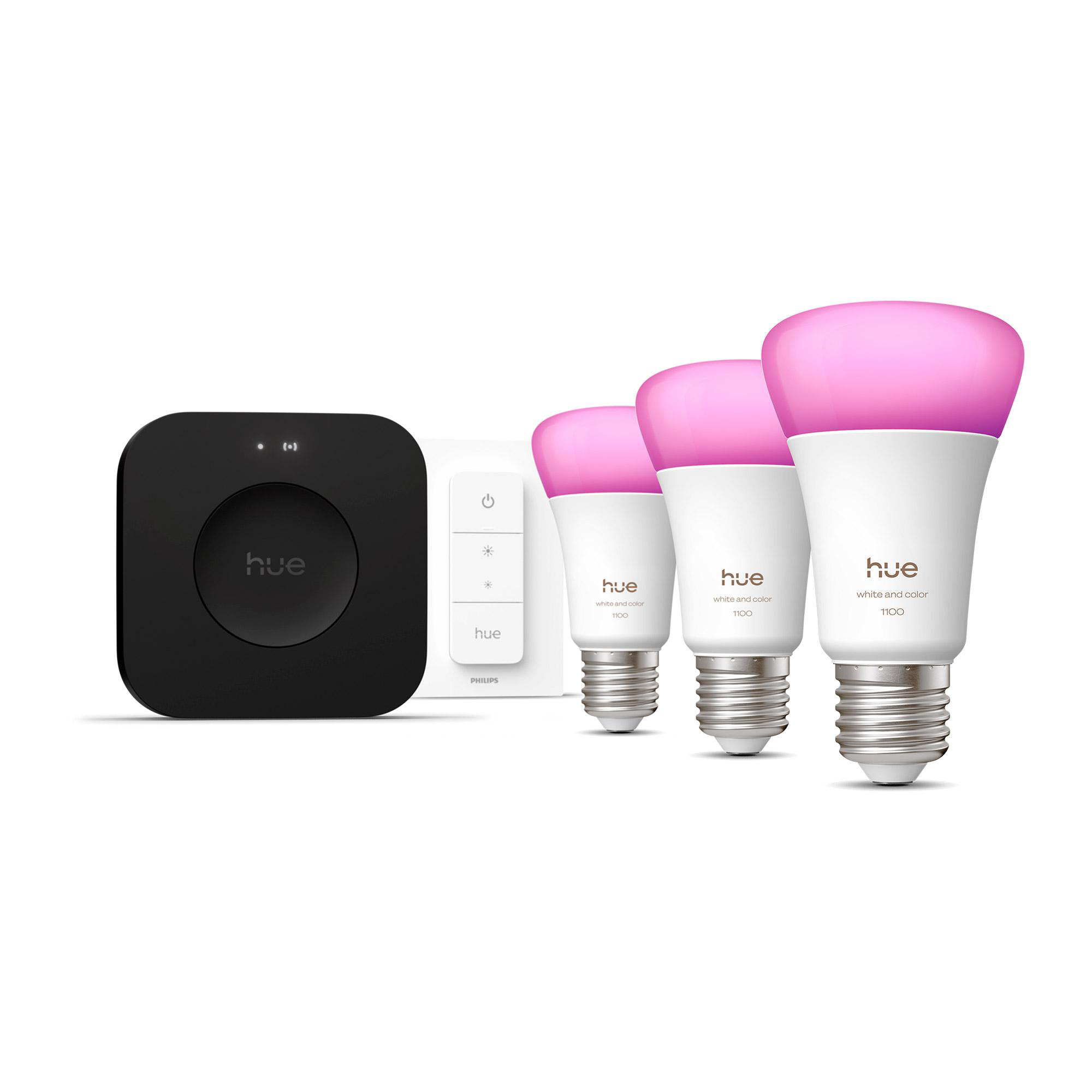 Set Philips Hue Smart Lights mit Bridge und Dimmschalter, rosa Glühbirnen. Der Hintergrund ist weiß.