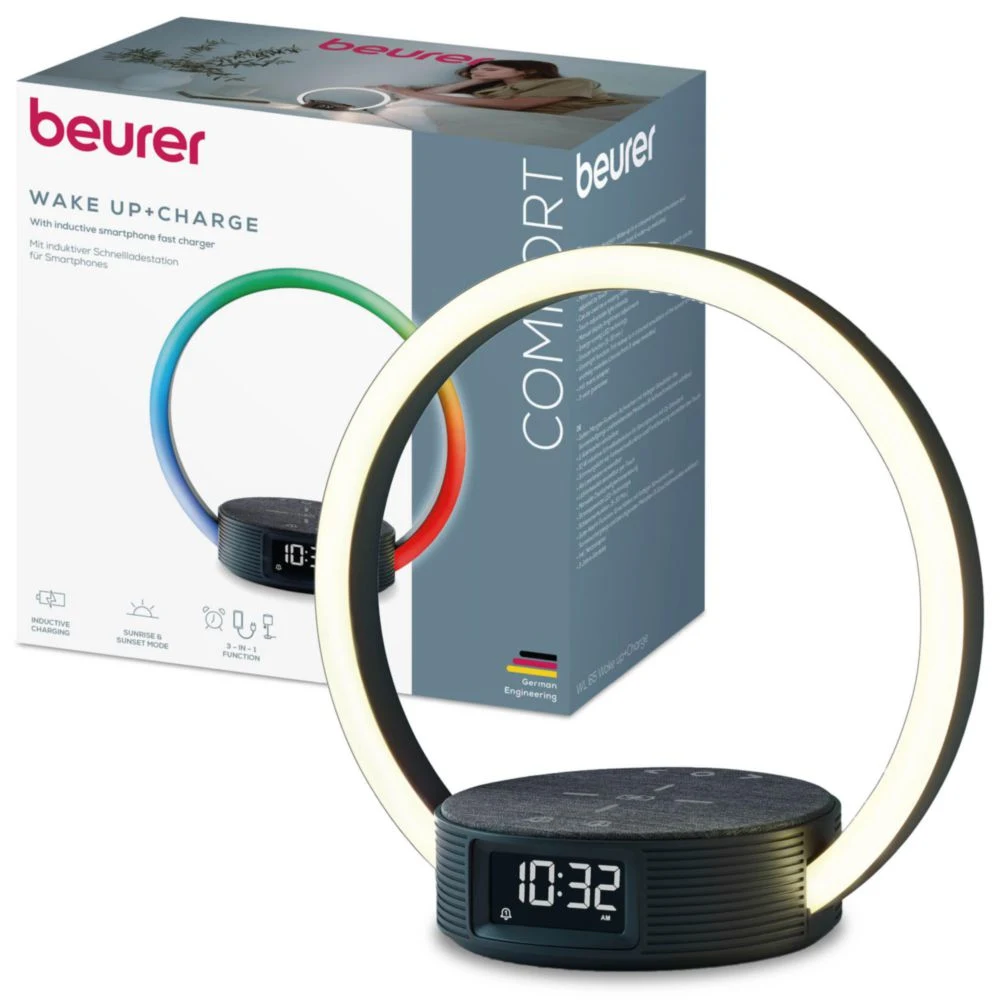 Un réveil beurer Wake Up+Charge. Il possède une lumière annulaire, un écran affichant 10h32 et une boîte en arrière-plan.