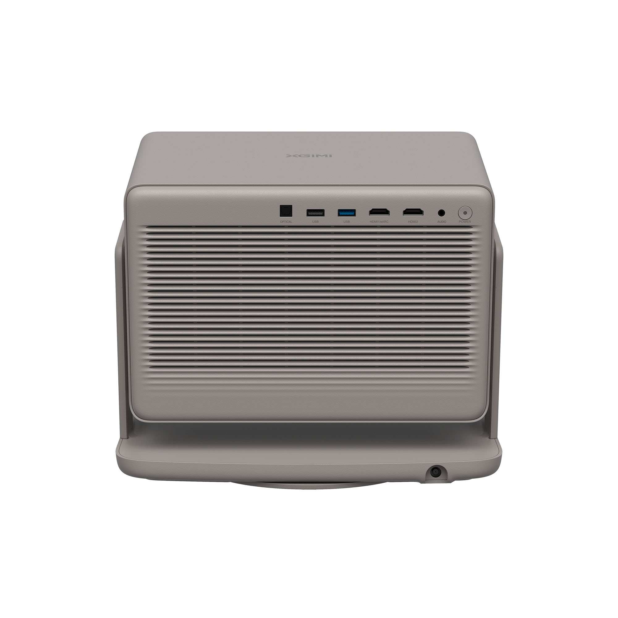 Se muestra un proyector XGIMI gris. Tiene varios puertos y botones. La parte frontal tiene una rejilla similar a un altavoz.