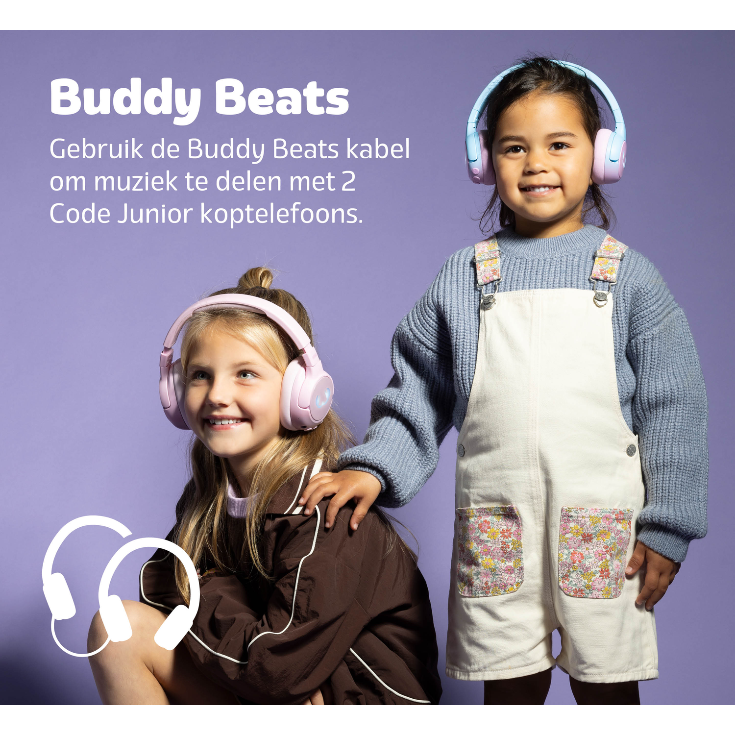 Two smiling girls wearing headphones. One is standing in overalls, the other is kneeling in a brown jacket, both on a purple background.