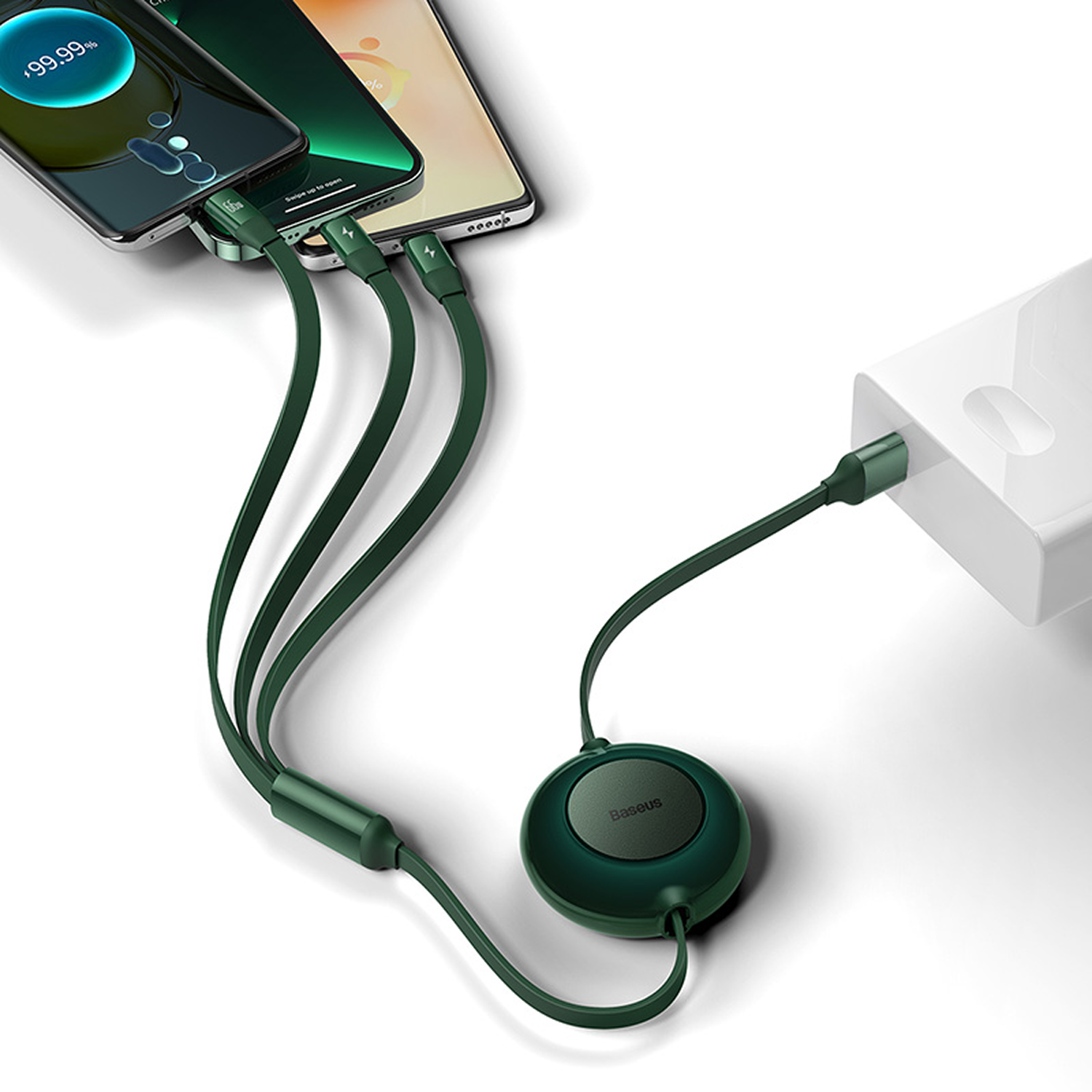 Tres teléfonos se cargan con cables verdes, conectados a un banco de energía. Se ve un carrete de cable verde Baseus.