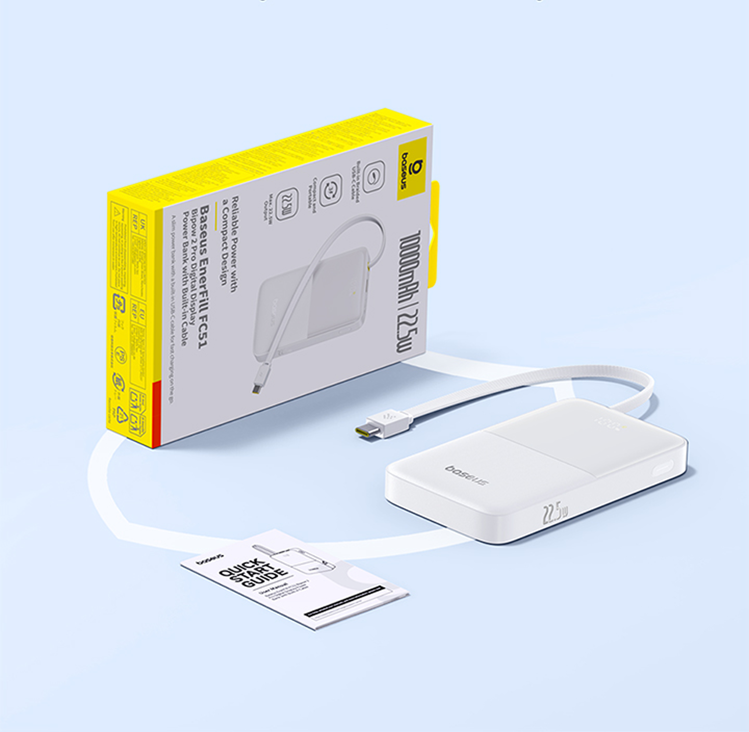 Un banco de energía blanco con cable incorporado, una caja amarilla y blanca y una guía de inicio rápido sobre una superficie azul.