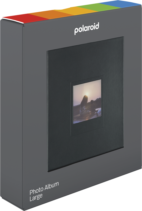 Caja de álbum de fotos Polaroid. Gris con marco negro. La foto muestra dos personas al atardecer. Colores del arcoíris arriba.