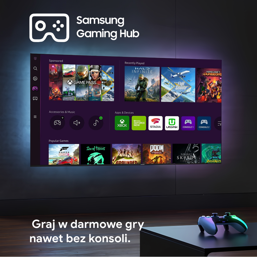 Samsung Gaming Hub na telewizorze prezentujący gry. Kontroler spoczywa na czarnym stole przed telewizorem.