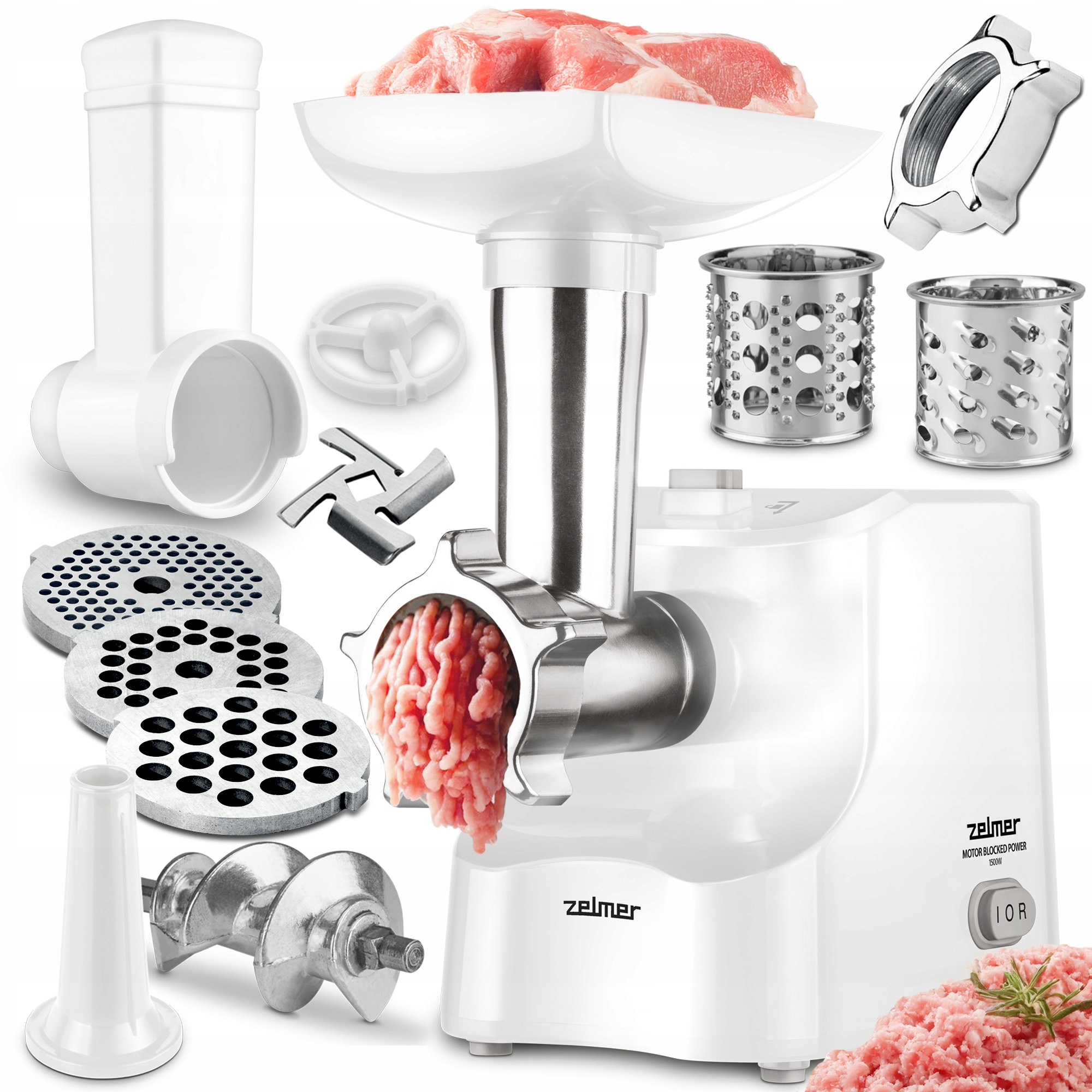 Biała maszynka do mięsa z różnymi częściami i surowym mięsem. Mielone mięso wychodzi z maszynki.