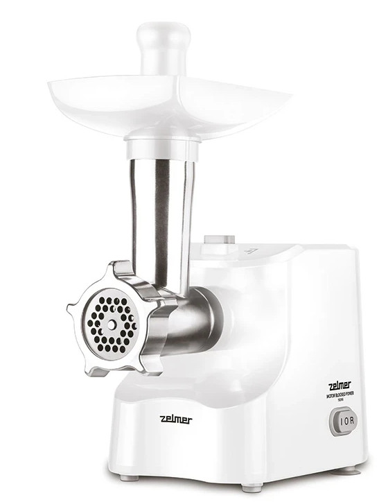Biała i srebrna maszynka do mięsa Zelmer. Posiada tackę podającą, mechanizm mielący i przycisk zasilania.