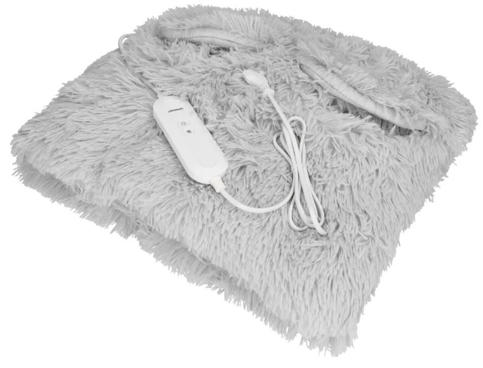 Puszysty, szary elektryczny podgrzewacz z białym pilotem i kablem. Podkładka jest prostokątna i ma pluszową teksturę.