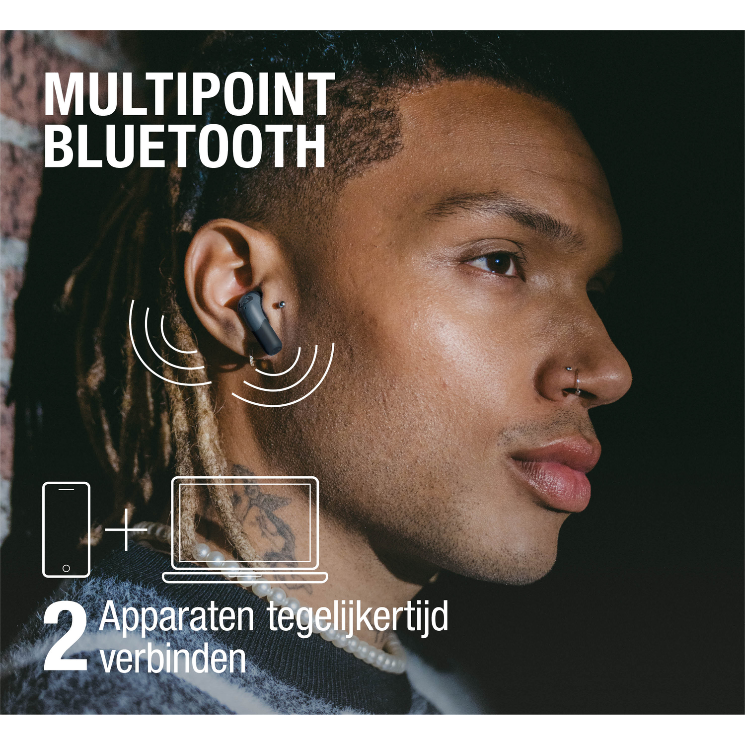 A man wearing an earbud, the image has text that says 'MULTIPOINT BLUETOOTH' and icons of a phone and laptop.