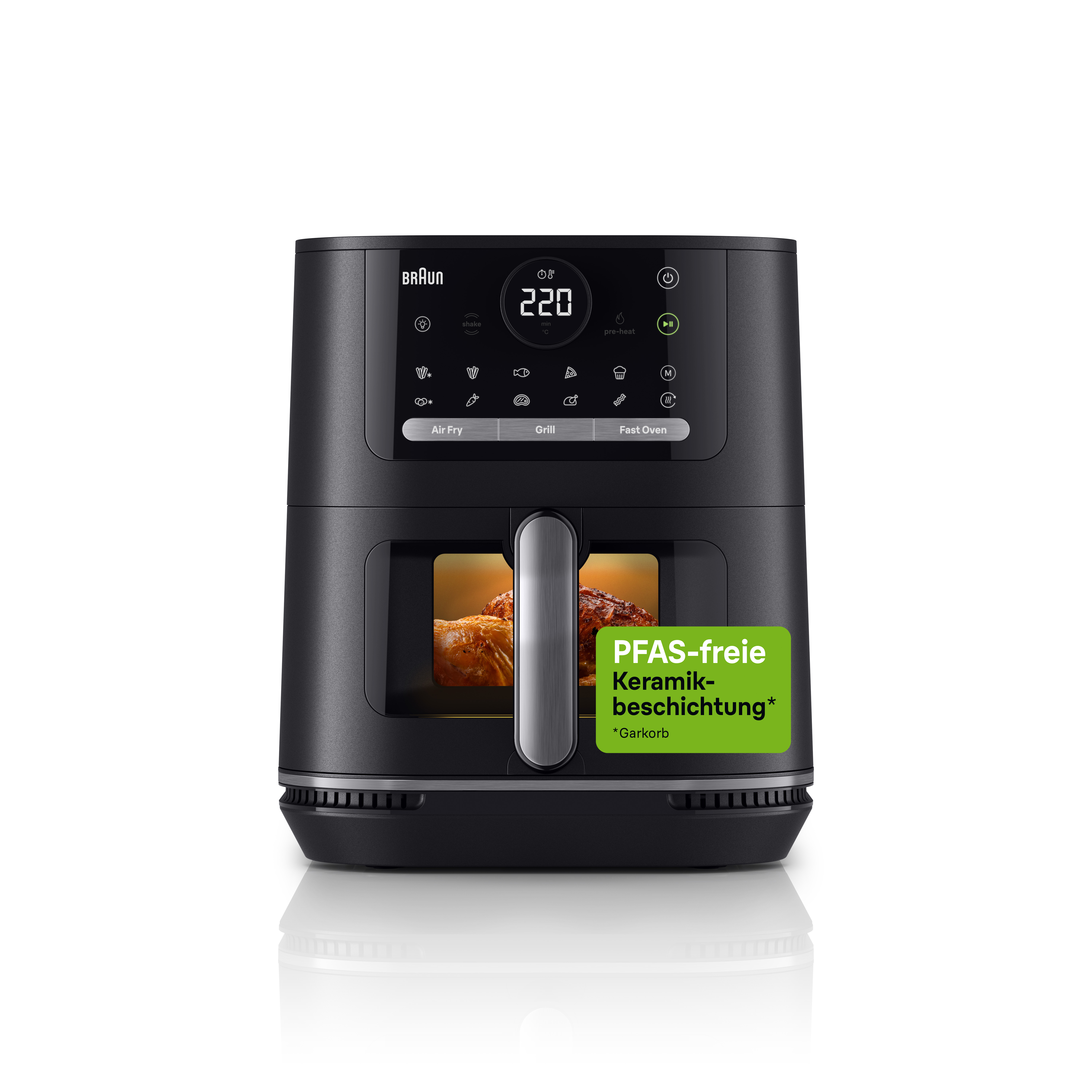 Schwarze Braun Heißluftfritteuse mit Digitalanzeige und Essen darin. Grünes Etikett sagt PFAS-freie Keramikbeschichtung.