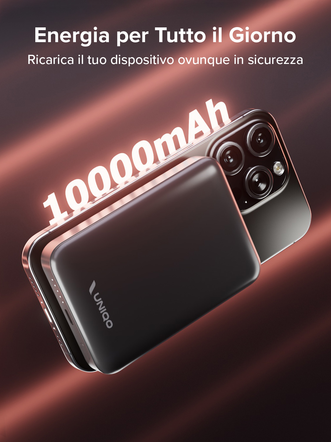 Un power bank nero e un telefono su sfondo scuro. Il power bank ha il marchio UNIQO. Il telefono è a fuoco.