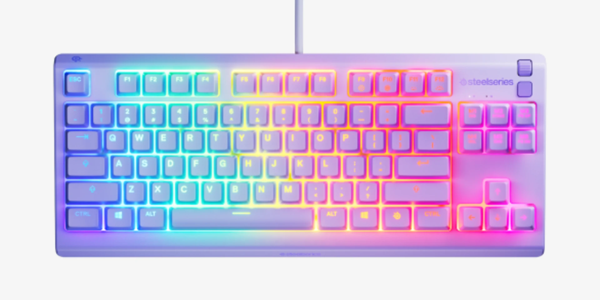 Egy SteelSeries billentyűzet szivárványos LED háttérvilágítással. A gombok világos lilák, a világítás színes.