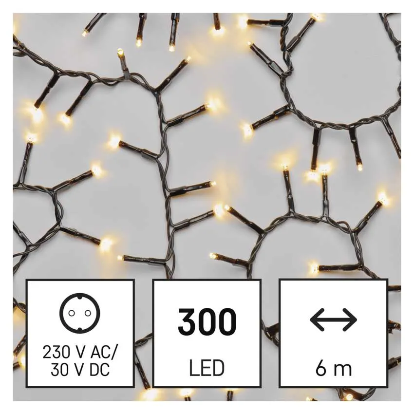 Füzérfények 300 LED-del, 6 m hosszú, teljesítmény részletekkel a dobozokban. Az izzók arany, a vezetékek feketék.