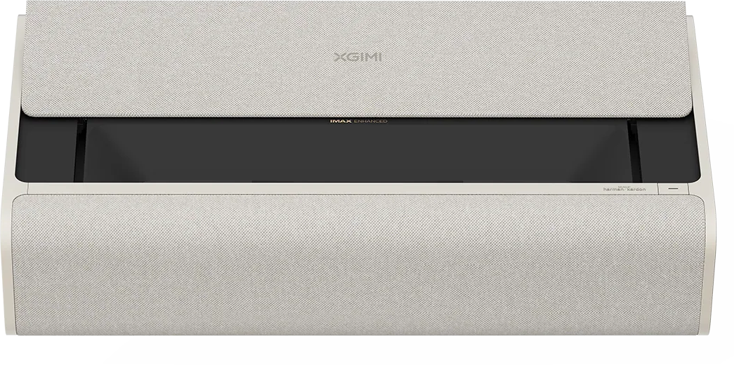 Un projecteur crème avec une housse en tissu. La marque XGIMI est visible. En dessous, un panneau noir avec IMAX Enhanced.