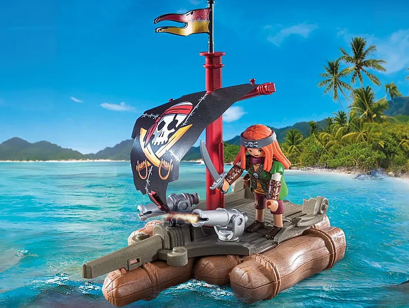 Ein Spielzeugpirat auf einem Floß mit Totenkopfflagge. Der Pirat hält ein Schwert. Im Hintergrund sind eine tropische Insel und das Meer zu sehen.