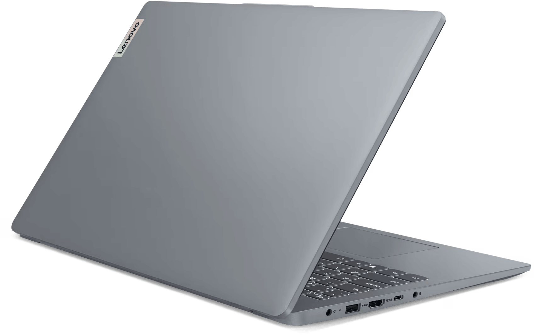 Egy szürke Lenovo laptop nyitva, látható a billentyűzet és a képernyő. A Lenovo logója a bal felső sarokban van.