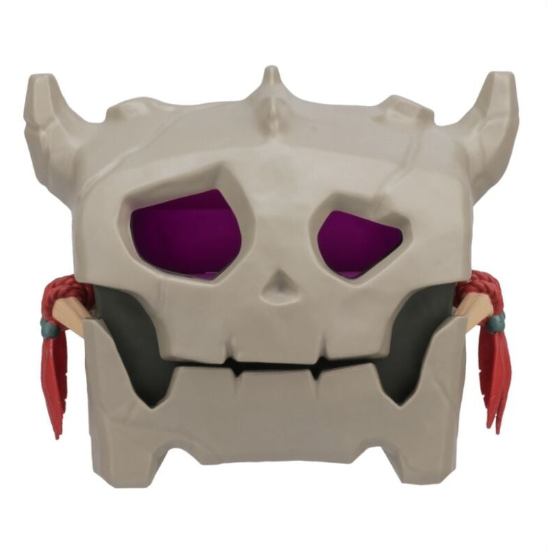 Una caja con forma de calavera con ojos morados, cuernos y decoraciones rojas. Tiene una sonrisa dentuda y fondo blanco.