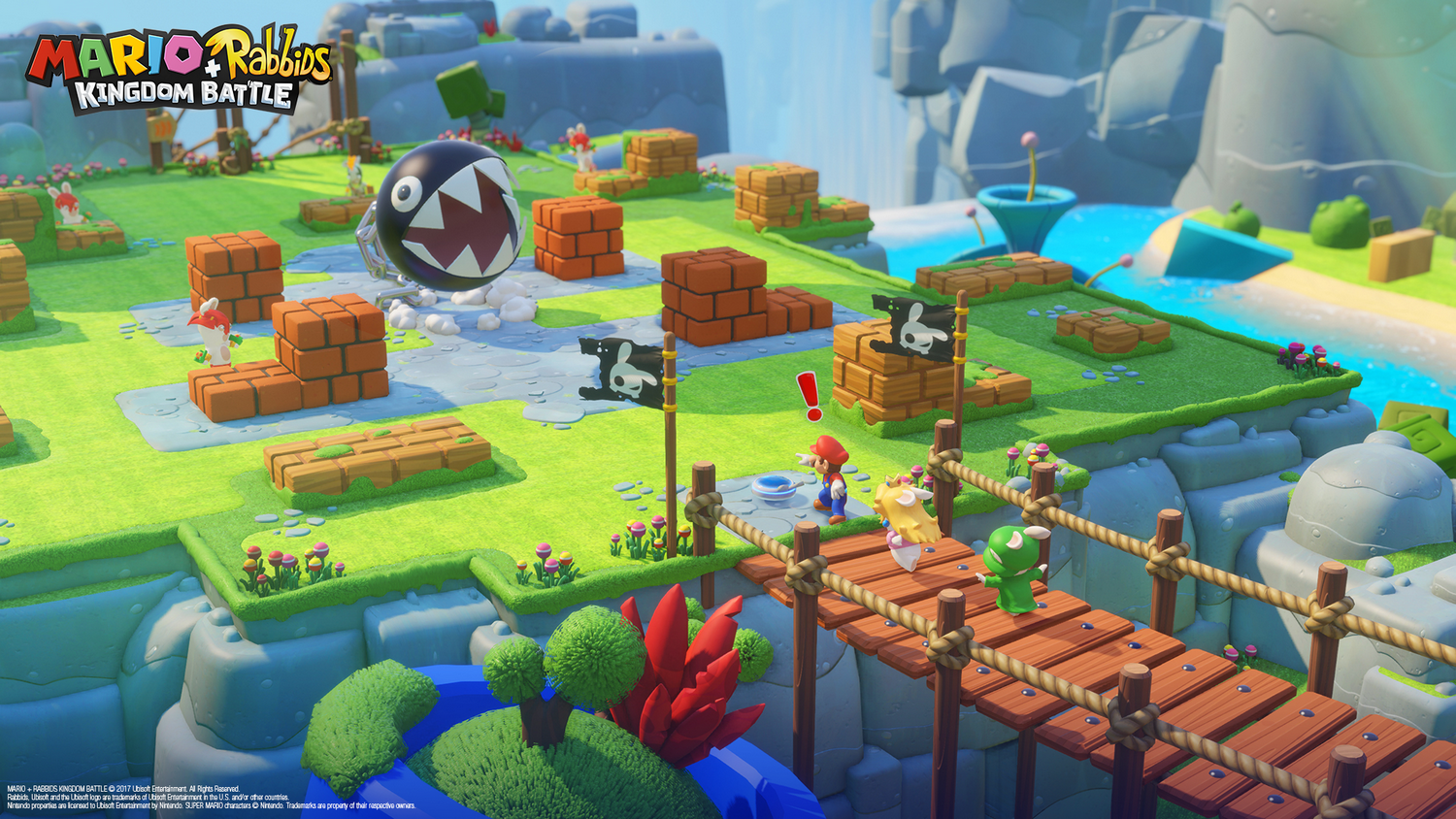 Una escena de juego con Mario, Peach y un Rabbid. Hay estructuras de ladrillo, un puente, un Chain Chomp y banderas piratas.