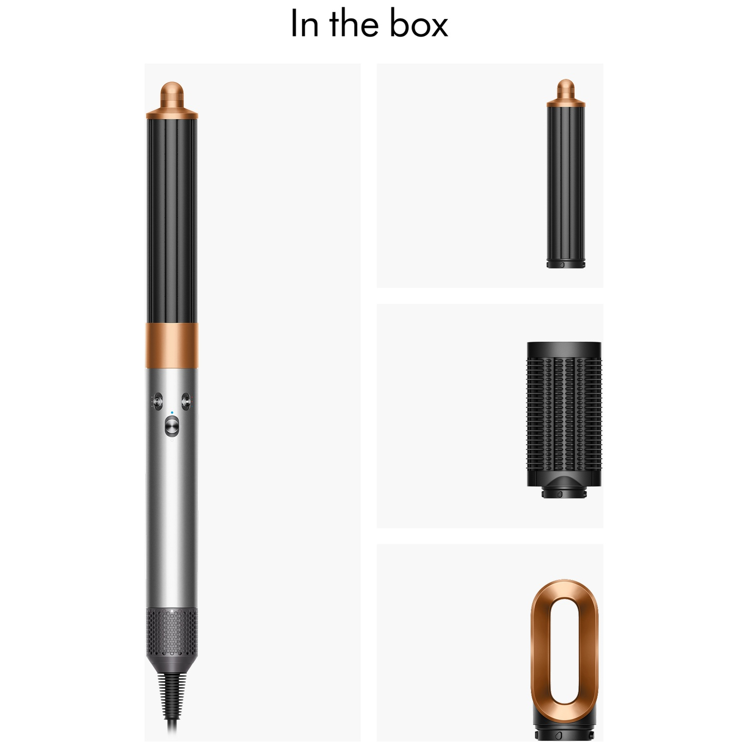 Image shows a hair styling tool and its attachments. The tool is silver and black with gold accents. Accessories include a barrel and a ring.