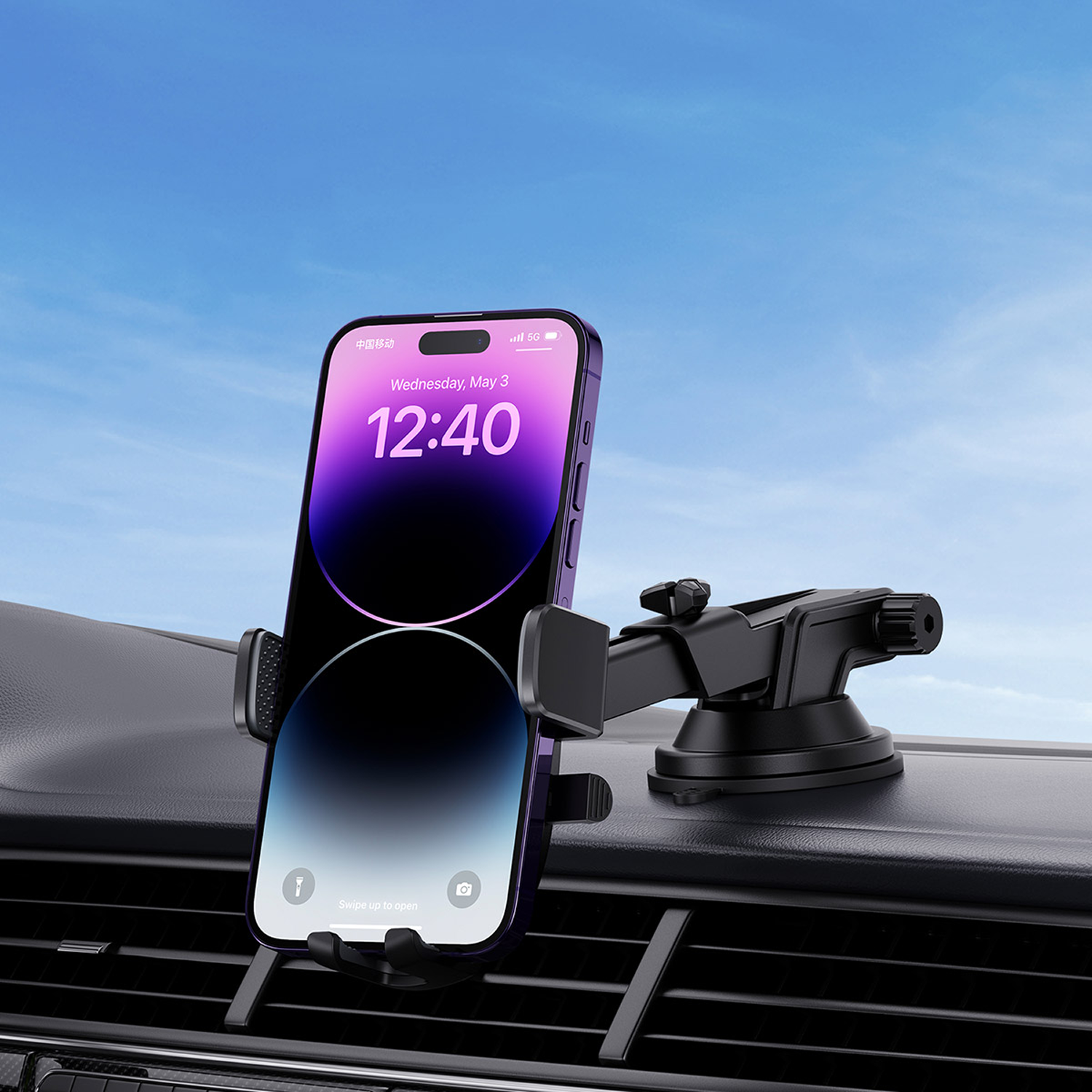 Un smartphone está montado en un soporte para coche que muestra la hora 12:40 en la pantalla.