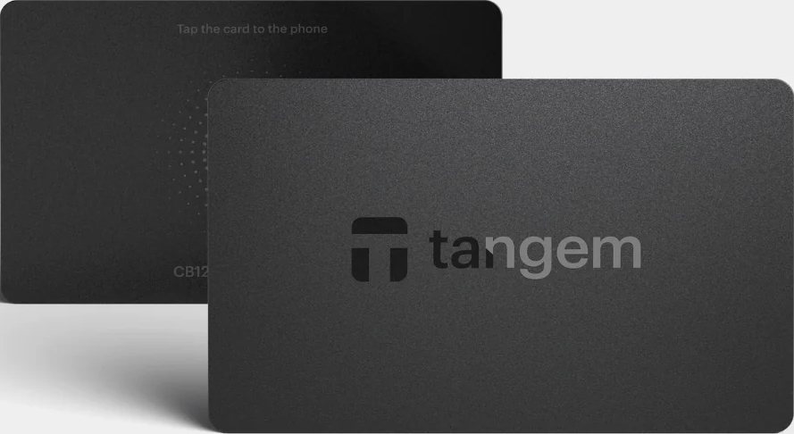 Zwei schwarze Karten. Eine Karte hat den Text 'Tap the card to the phone' und 'CB12'. Die andere hat das 'tangem'-Logo.
