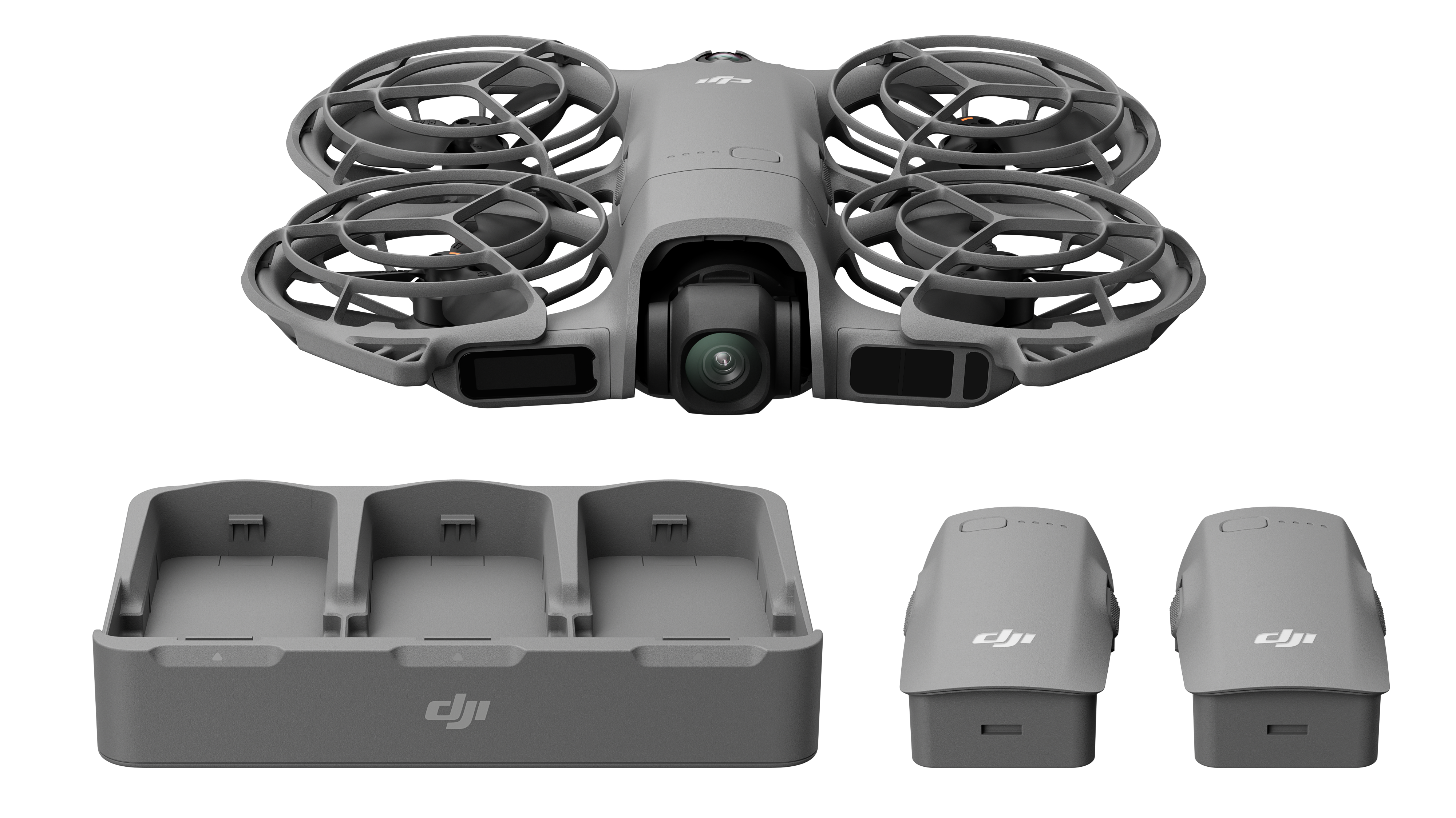 Szary dron z klatkami ochronnymi, stacja ładująca i dwa akumulatory są wyświetlane na białym tle.