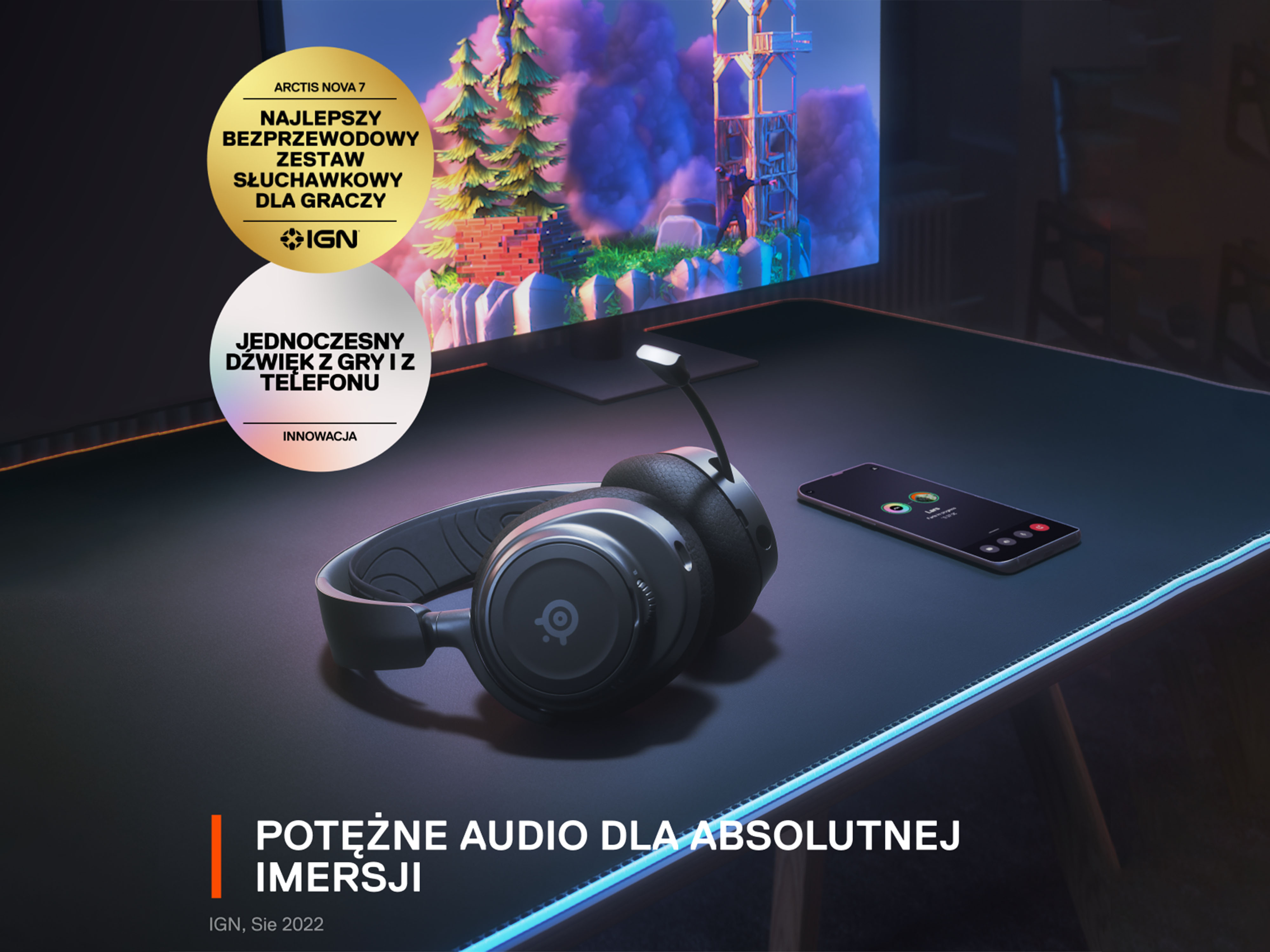 Czarne słuchawki dla graczy na czarnym biurku z telefonem. Ekran wyświetla scenę z gry i złotą nagrodę.