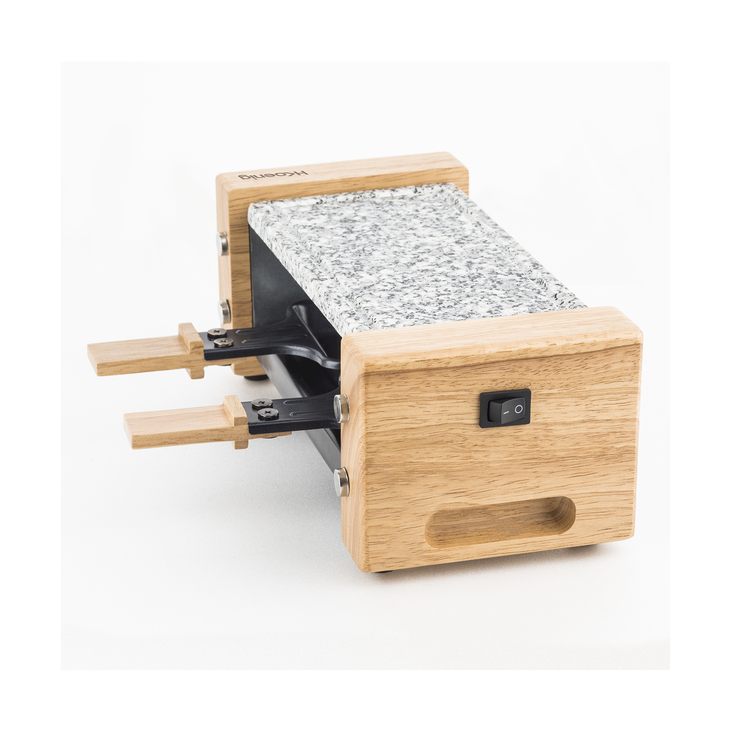 Grill per raclette con telaio in legno, piano in granito e interruttore nero. Due maniglie in legno per il formaggio.