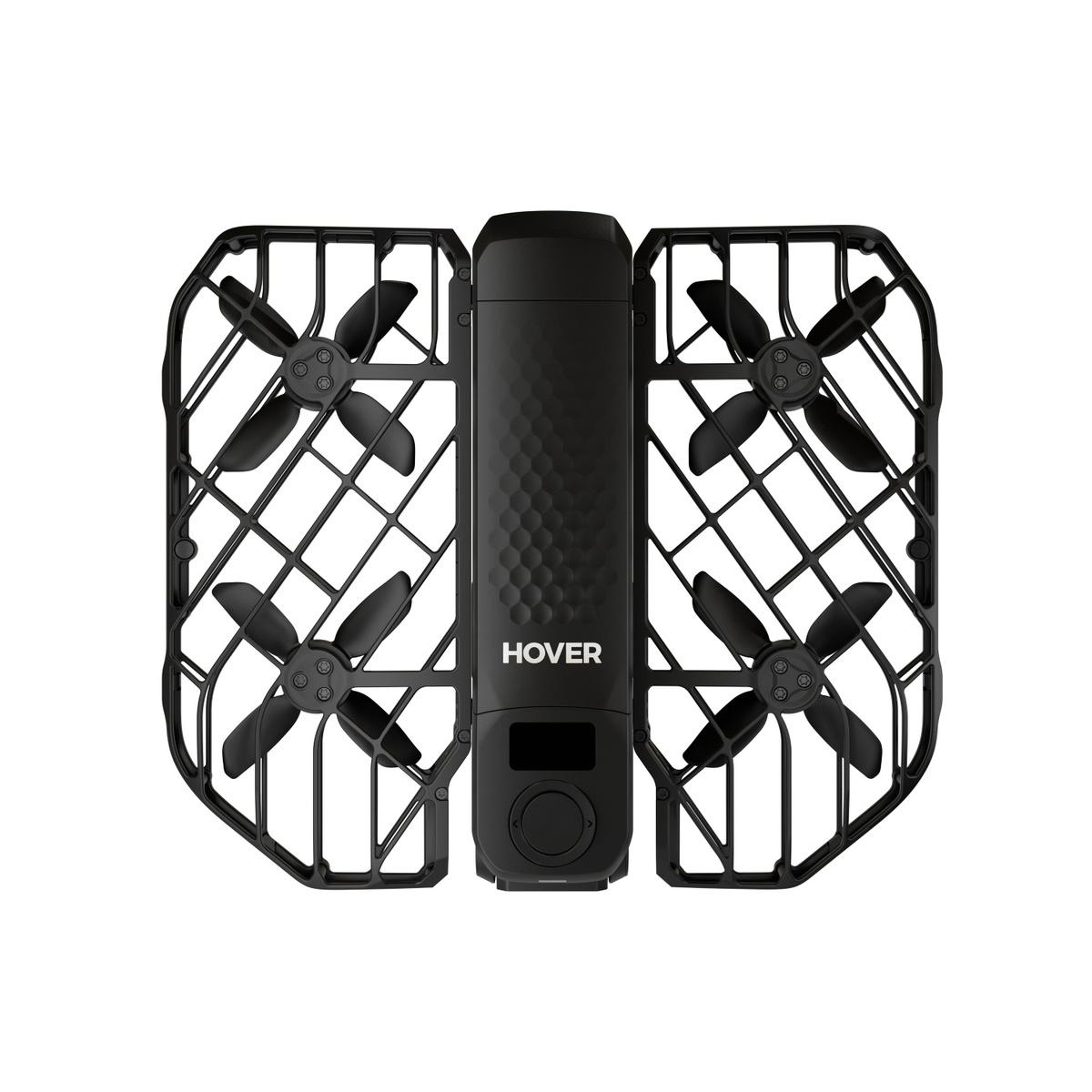 Schwarze Drohne mit vier Propellern, geschützt durch einen Käfig. Das Wort HOVER steht auf dem Gehäuse.